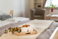 Posteľ alebo postele v izbe v ubytovaní P&O Podwale Apartments