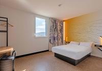 Posteľ alebo postele v izbe v ubytovaní B&B HOTEL Landerneau Bois Noir