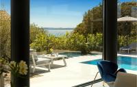 Bazén v ubytování Villa House Of Poseidon nebo v jeho okolí