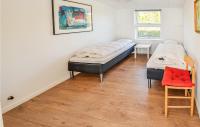 Postel nebo postele na pokoji v ubytování Holiday Home Harbokobbel