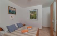 Postel nebo postele na pokoji v ubytování Apartment Sevid 53