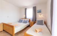 Postel nebo postele na pokoji v ubytování Apartment Sevid 53