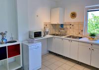 Kuchnia lub aneks kuchenny w obiekcie Apartments Savic