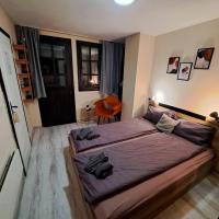 Postel nebo postele na pokoji v ubytování Aura house