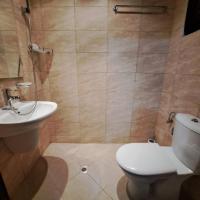 Koupelna v ubytování Aura house
