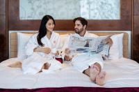Grand Millennium Al Wahda Hotel and Executive Apartments Abu Dhabiにあるベッド