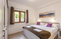 Posteľ alebo postele v izbe v ubytovaní Six-Bedroom Holiday Home In Zagvozd