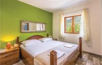 Posteľ alebo postele v izbe v ubytovaní Six-Bedroom Holiday Home In Zagvozd