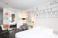 a bedroom with a bed and a drawing on the wall at NU Hotel in Brooklyn