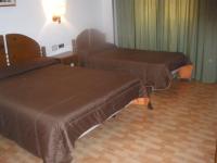 Posteľ alebo postele v izbe v ubytovaní Hotel Elena María