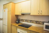 Kuchyň nebo kuchyňský kout v ubytování Apartamento Las Chapas - bonito y tranquilo