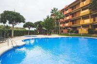 Bazén v ubytování Apartamento Las Chapas - bonito y tranquilo nebo v jeho okolí