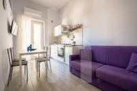 Kuchyňa alebo kuchynka v ubytovaní Homiday - Residenza D'Annunzio