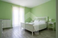 Posteľ alebo postele v izbe v ubytovaní Homiday - Residenza D'Annunzio