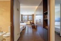 A bed or beds in a room at Hotel Coia de Vigo