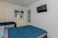 Postel nebo postele na pokoji v ubytování Apartment Eses