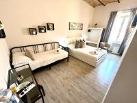 A bed or beds in a room at San Pietro Rooms 84