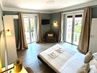 A bed or beds in a room at San Pietro Rooms 84
