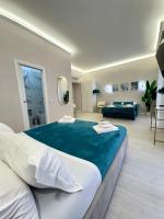 A bed or beds in a room at San Pietro Rooms 84
