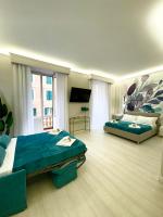 A bed or beds in a room at San Pietro Rooms 84