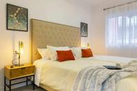 Posteľ alebo postele v izbe v ubytovaní Apartamento Pink Puerto