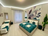 A bed or beds in a room at San Pietro Rooms 84
