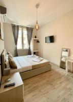 A bed or beds in a room at San Pietro Rooms 84