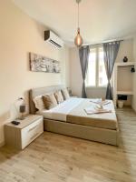 A bed or beds in a room at San Pietro Rooms 84