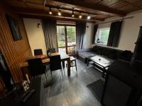 A television and/or entertainment centre at Chata na Liptove
