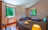 A bed or beds in a room at Valguerriera - Rosa Bianca