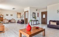 A seating area at Amazing Home In Kokari