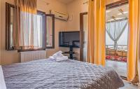 A bed or beds in a room at Amazing Home In Kokari
