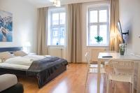 A bed or beds in a room at Delightful 2BR Apt.-Near Wiener Stadthalle