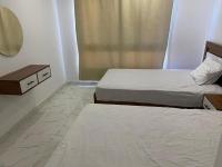 Postel nebo postele na pokoji v ubytování Fanadir Bay Resort & Aqua Escape