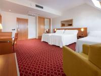 Hotel Zentral Leónにあるベッド