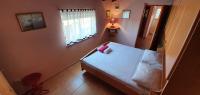 Posteľ alebo postele v izbe v ubytovaní Apartment Julija