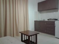 Kuchyň nebo kuchyňský kout v ubytování Fantasia Hotel Apartments