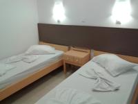 Postel nebo postele na pokoji v ubytování Fantasia Hotel Apartments