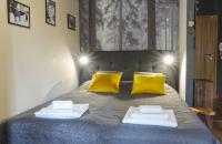 Postel nebo postele na pokoji v ubytování Borovets Dream Studio