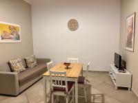 Telewizja i/lub zestaw kina domowego w obiekcie Central Balcony & Terrace Apartments near Attractions