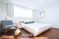 THE ROOT2 HOTELにあるベッド