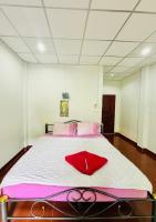 Postel nebo postele na pokoji v ubytování TAMONWAN HOUSE Koh Tao