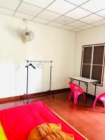 Postel nebo postele na pokoji v ubytování TAMONWAN HOUSE Koh Tao