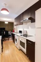 A kitchen or kitchenette at Apartamentos Day Madrid SANTO DOMINGO Centro Gran Via Sol Malasaña