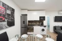 A kitchen or kitchenette at Apartamentos Day Madrid SANTO DOMINGO Centro Gran Via Sol Malasaña