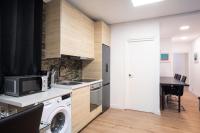 A kitchen or kitchenette at Apartamentos Day Madrid SANTO DOMINGO Centro Gran Via Sol Malasaña