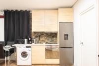 A kitchen or kitchenette at Apartamentos Day Madrid SANTO DOMINGO Centro Gran Via Sol Malasaña