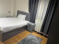 Postel nebo postele na pokoji v ubytování Modern 2 bedrooms apartment
