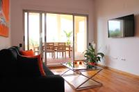 Televízia a/alebo spoločenská miestnosť v ubytovaní Denia Deluxe Chillout Experience