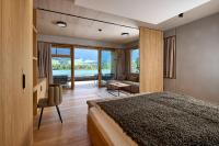 Posteľ alebo postele v izbe v ubytovaní Das Walchsee Aktivresort